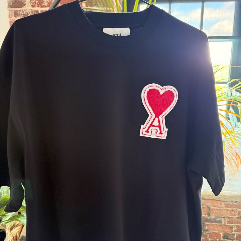 Ami Black Tee with Red Heart Accent